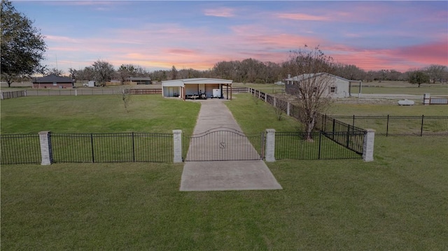 1796 Fawn Lake Dr, Bryan, TX 77808 - view of home's community featuring a detached carport, a rural view, a gate, and driveway