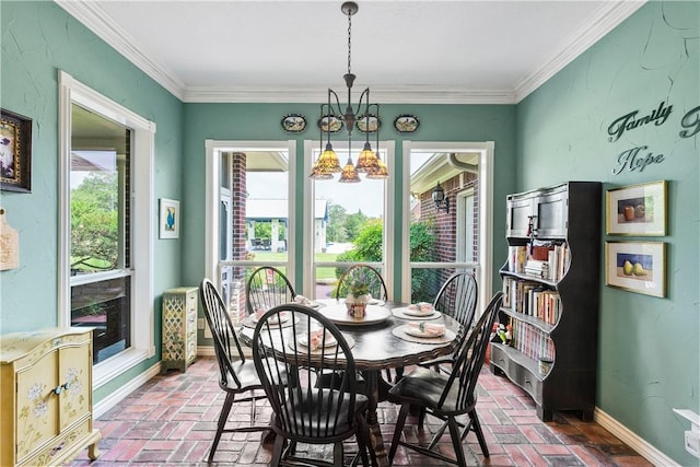 17265 Fm 2154th Rd, College Station, TX 77845 - dining room with brick floors, a chandelier, baseboards, and ornamental molding