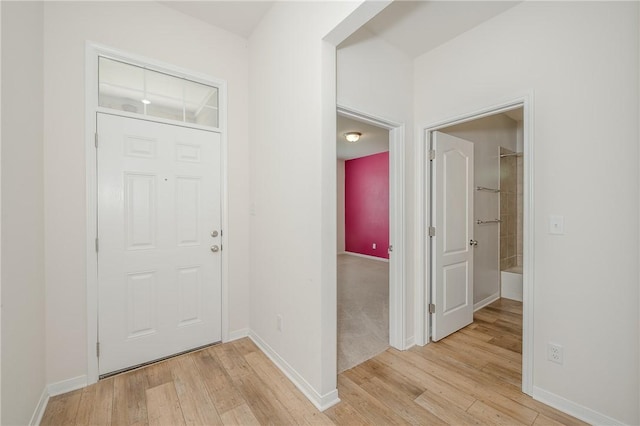 entrance foyer featuring light wood-type flooring