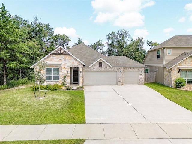 craftsman-style house with a garage and a front yard