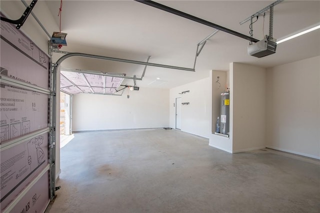 garage featuring electric water heater and a garage door opener