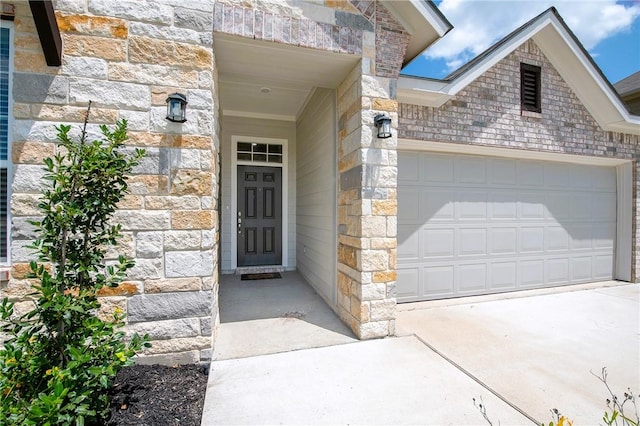 entrance to property featuring a garage