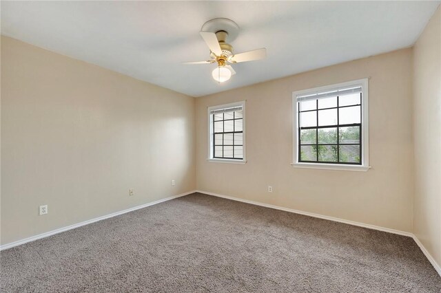 2400 Longmire Dr Unit 205, College Station, TX 77845 - carpeted empty room featuring baseboards and a ceiling fan
