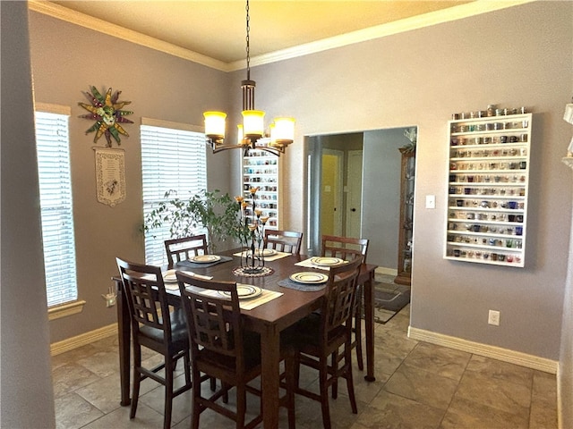 7585 Field Creek Estates Dr, Bryan, TX 77808 - dining area with a chandelier, ornamental molding, and baseboards