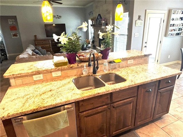 7585 Field Creek Estates Dr, Bryan, TX 77808 - kitchen with stainless steel dishwasher, a sink, ornamental molding, and light stone counters