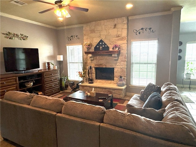 7585 Field Creek Estates Dr, Bryan, TX 77808 - living area featuring ornamental molding, ceiling fan, a fireplace, and baseboards