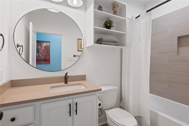 3914 Alamosa St, College Station, TX 77845 - bathroom with toilet, vanity, and shower / bath combo with shower curtain