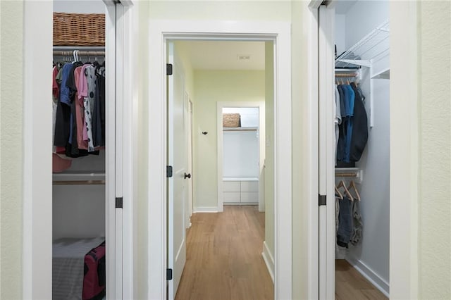 3914 Alamosa St, College Station, TX 77845 - hallway with wood finished floors and baseboards