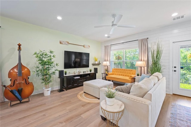 3914 Alamosa St, College Station, TX 77845 - living area with light wood finished floors, ceiling fan, and recessed lighting