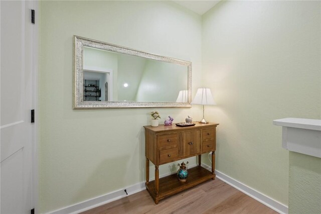 3914 Alamosa St, College Station, TX 77845 - detailed view of wood finished floors and baseboards