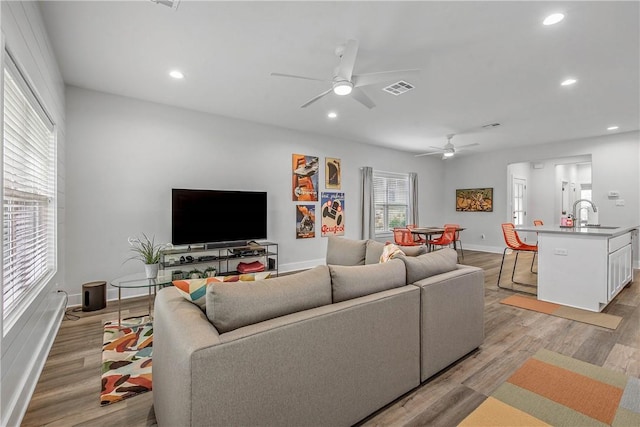 1749 Dakota Ln, College Station, TX 77845 - living area with ceiling fan, light wood-style flooring, recessed lighting, and baseboards
