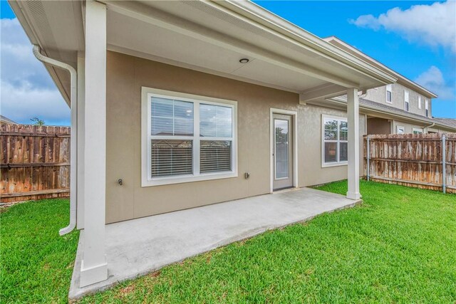 1749 Dakota Ln, College Station, TX 77845 - back of property featuring a patio area and stucco siding