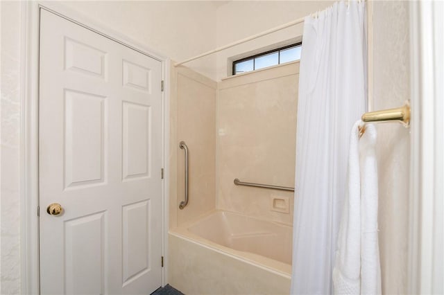 bathroom with shower / bath combination with curtain