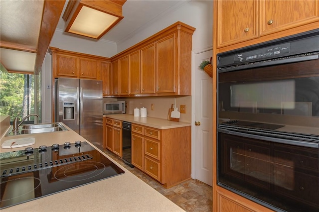 kitchen with black appliances and sink