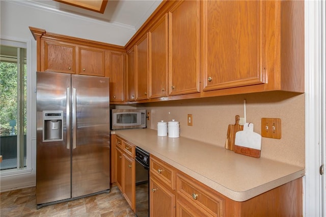 kitchen featuring crown molding and appliances with stainless steel finishes