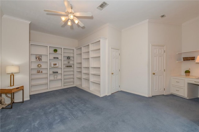 interior space featuring ceiling fan, dark carpet, and crown molding