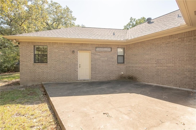 rear view of property with a patio area