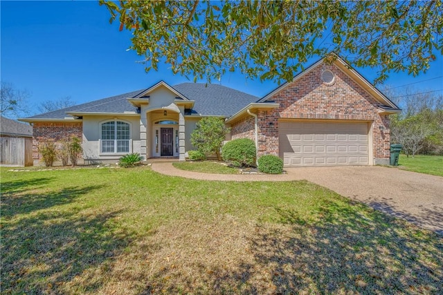 ranch-style home with driveway, brick siding, an attached garage, and a front yard