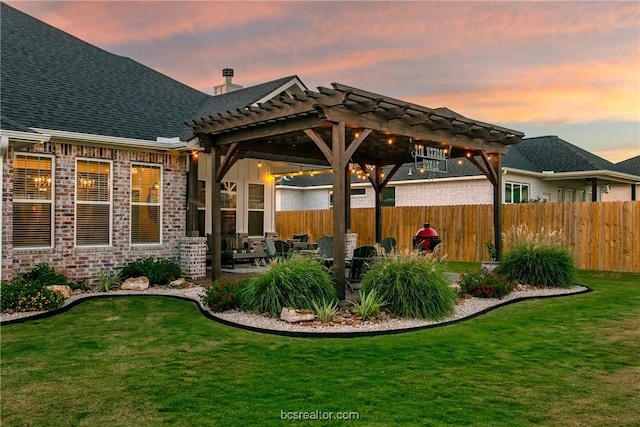 3504 Abingdon Cv, Bryan, TX 77808 - yard at dusk with a pergola and a patio