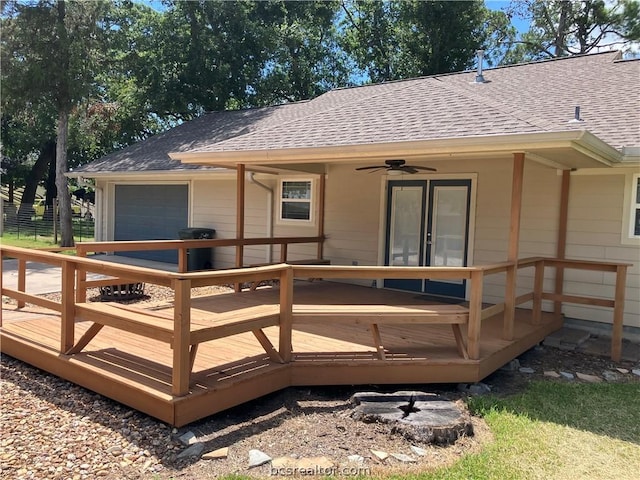 back of property featuring a wooden deck and ceiling fan