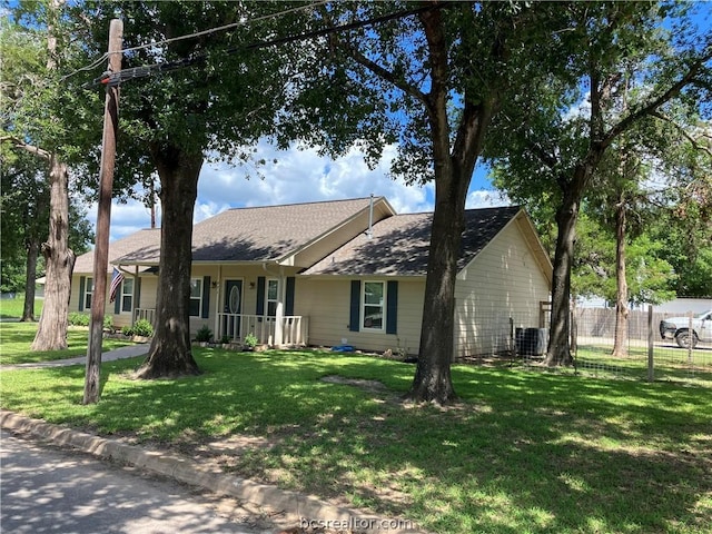 single story home with a front lawn