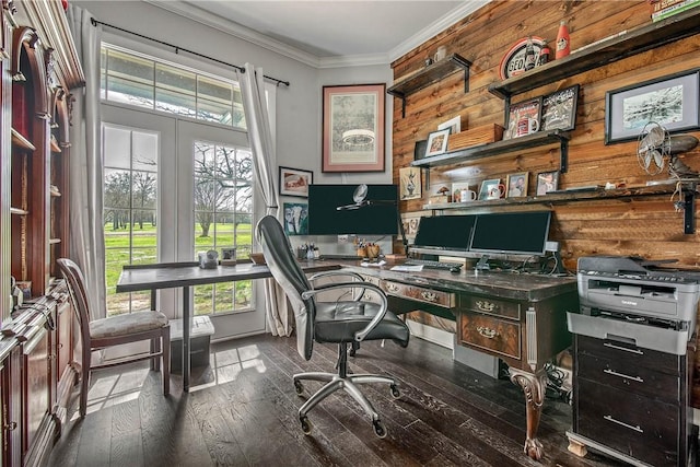 office area with wood-type flooring, wood walls, and crown molding