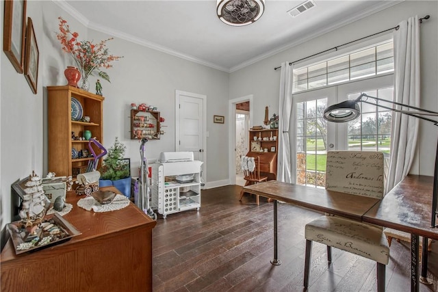 office space with baseboards, visible vents, ornamental molding, dark wood-type flooring, and french doors