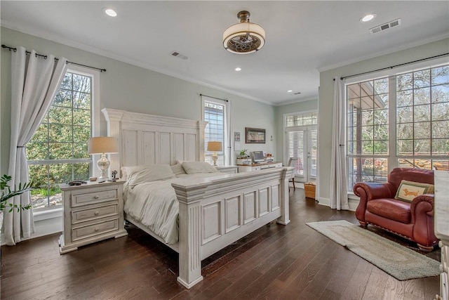 bedroom featuring dark wood-type flooring, recessed lighting, visible vents, and ornamental molding