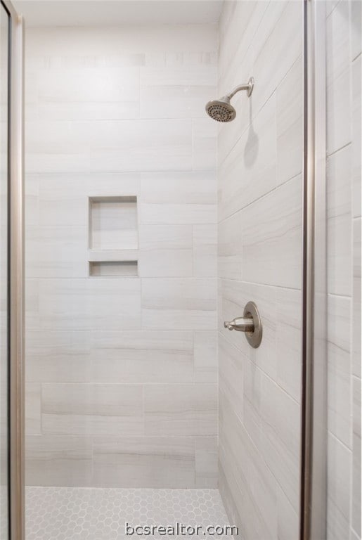 full bathroom with a stall shower