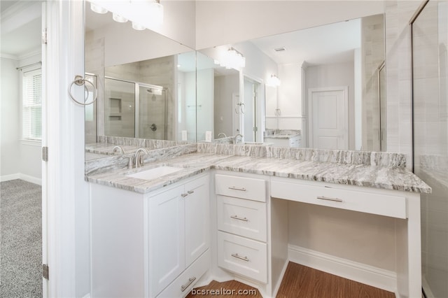 full bath featuring a shower stall and vanity