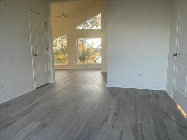 15933 Goliad Loop, Temple, TX 76502 - empty room with wood finished floors, baseboards, and ceiling fan