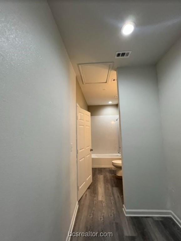 1305 W Villa Maria Rd Unit D107, Bryan, TX 77801 - corridor featuring wood finished floors, baseboards, and recessed lighting