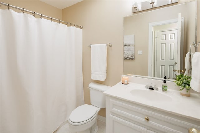 bathroom featuring vanity, a shower with shower curtain, and toilet