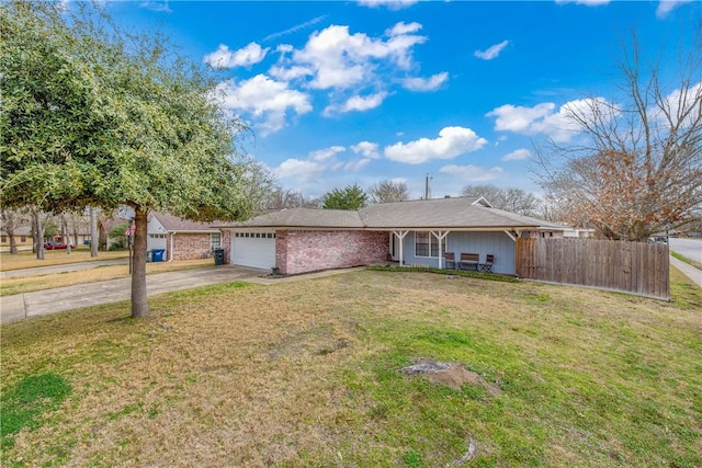 view of front of house with a garage and a front yard