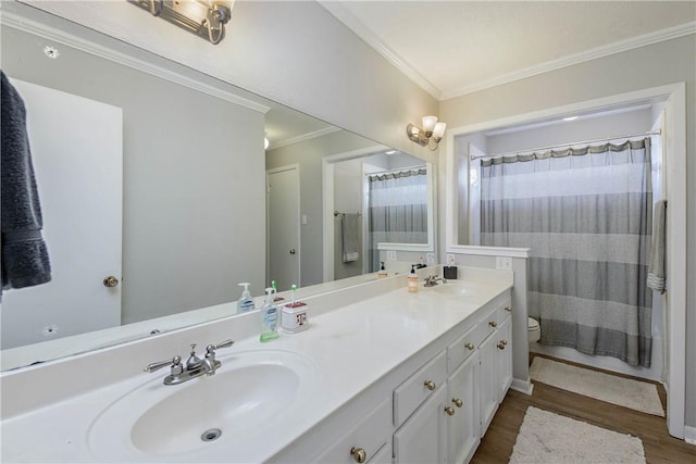 bathroom featuring walk in shower, toilet, ornamental molding, vanity, and hardwood / wood-style flooring