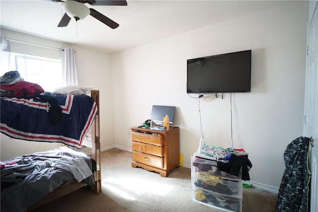 bedroom featuring carpet floors, ceiling fan, and baseboards