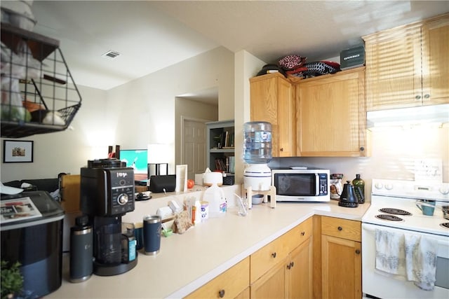 kitchen with white electric range oven, light countertops, visible vents, stainless steel microwave, and under cabinet range hood