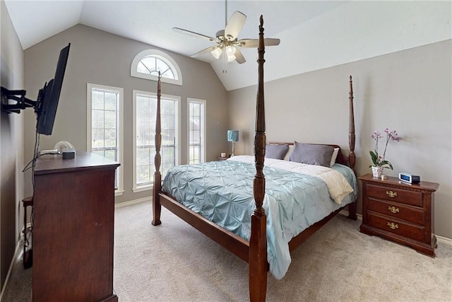 3900 Puffin Way, College Station, TX 77845 - bedroom with lofted ceiling, light colored carpet, a ceiling fan, and baseboards