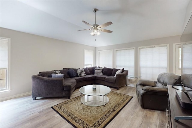 3900 Puffin Way, College Station, TX 77845 - living room featuring healthy amount of natural light, ceiling fan, vaulted ceiling, and light wood-style flooring