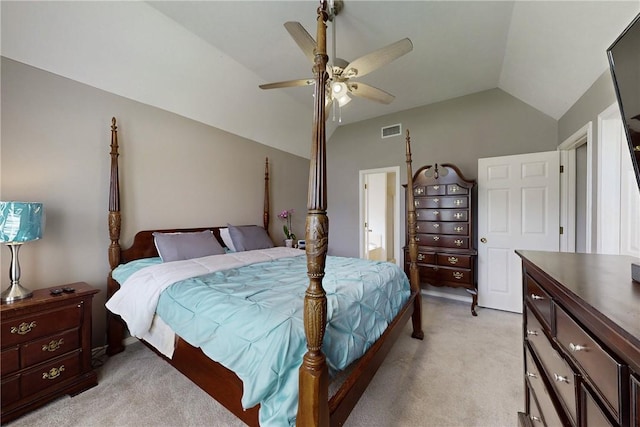 3900 Puffin Way, College Station, TX 77845 - bedroom with vaulted ceiling, light carpet, and a ceiling fan