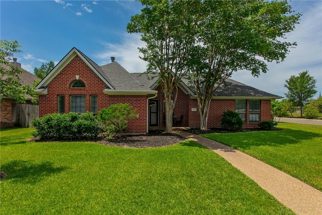 3900 Puffin Way, College Station, TX 77845 - view of front of property with brick siding and roof with shingles