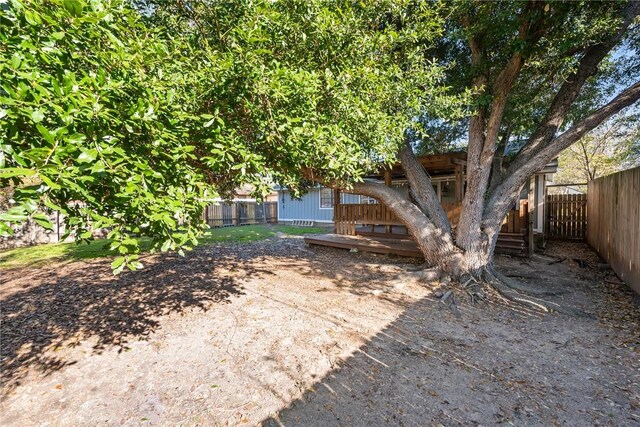 view of yard featuring a deck