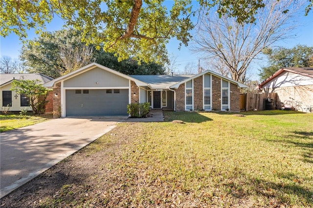 ranch-style house featuring a garage and a front yard