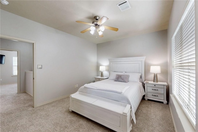 130 Forest Dr, College Station, TX 77840 - bedroom featuring light colored carpet, baseboards, and ceiling fan