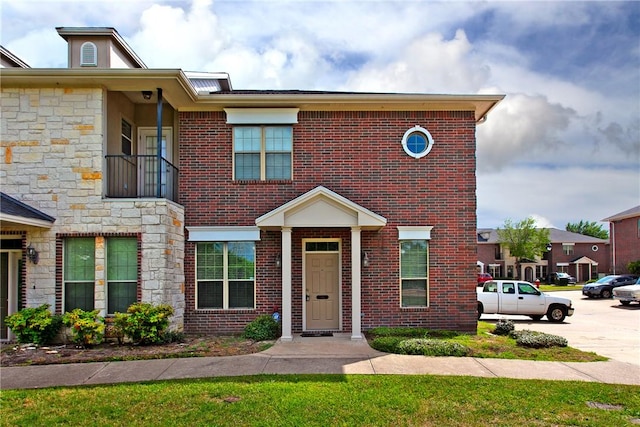 130 Forest Dr, College Station, TX 77840 - townhome / multi-family property with stone siding and brick siding