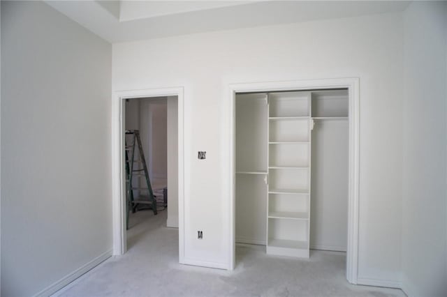 2581 Dove Xing, Navasota, TX 77868 - unfurnished bedroom with baseboards, a closet, and carpet floors