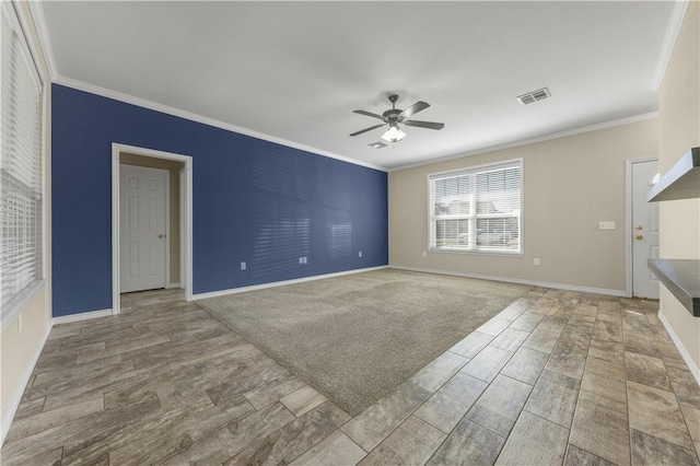 interior space featuring ceiling fan and ornamental molding