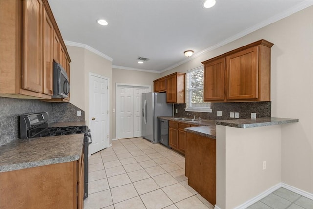 kitchen featuring kitchen peninsula, ornamental molding, sink, black appliances, and light tile patterned floors