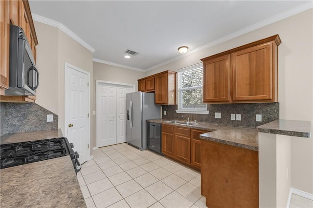 kitchen featuring backsplash, crown molding, sink, black appliances, and light tile patterned floors