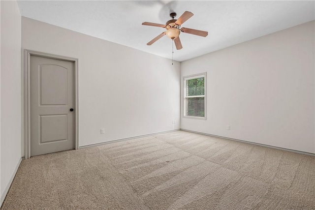 4662 Hidden Springs Way, College Station, TX 77845 - empty room featuring carpet flooring, ceiling fan, and baseboards